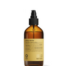 A 160ml brown glass bottle with black pump, labeled Oway Glossy Nectar | Rebuilding Oil Serum for Shine and Hair Strength, provides hair oil for frizz control, shine, and stronger hair.