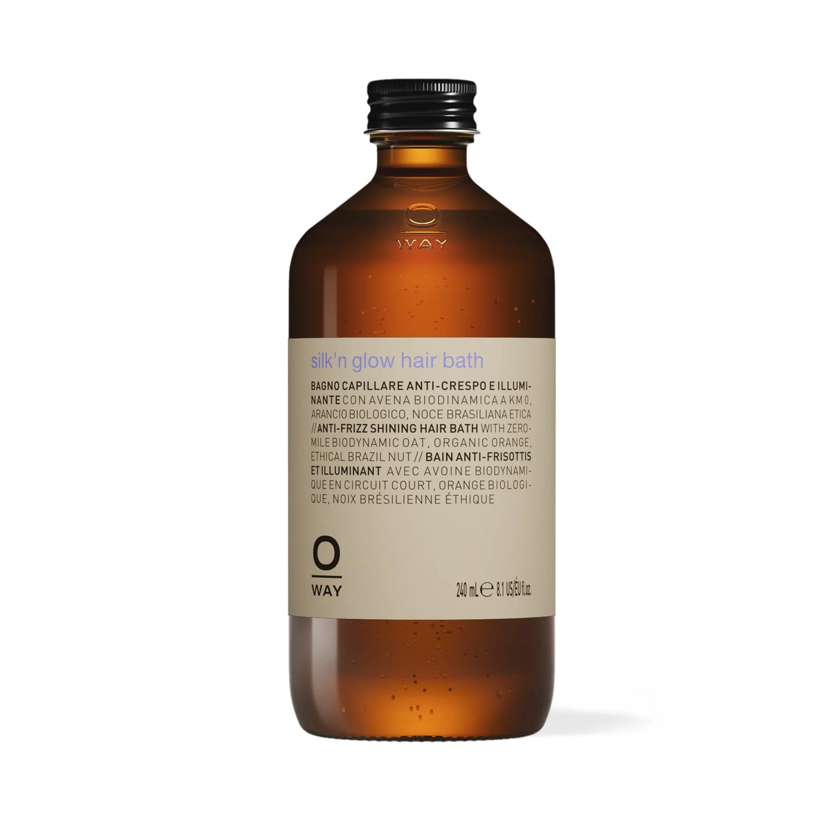 Brown bottle with label Oway SIlk'n GLow Hair Bath on a white background