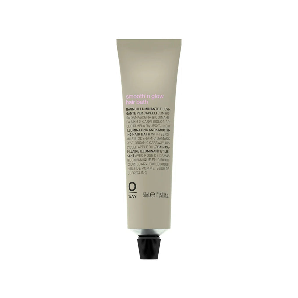A single tube of Oway Smoothin Glow Face Wash against a plain white background. The tube is a warm light beige with black text and a black cap, and features a small pink accent near the top.