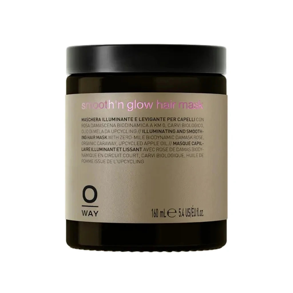 A jar of O'Way Smooth 'n Glow Hair Mask on a plain white background. The product is in a dark amber-brown jar with a black lid and a beige label featuring pink and black text.