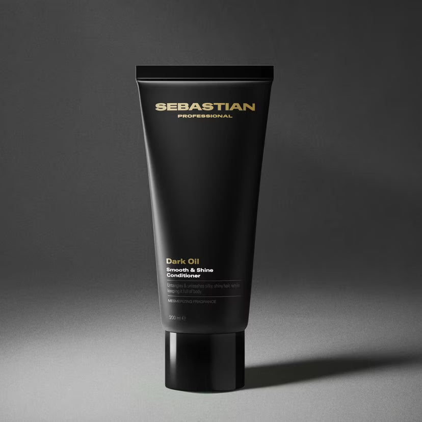 Black tube of Sebastian Dark Oil Smooth and Shine Conditioner on a gray background
