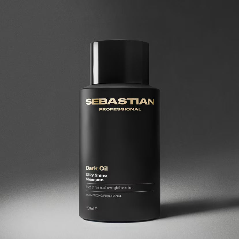 Sebastian Professional Dark Oil Silky Shine Shampoo bottle on a gray background