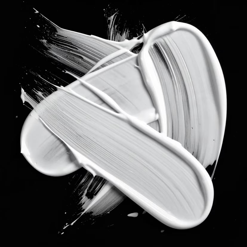 Black and white abstract art with brush strokes on a black background