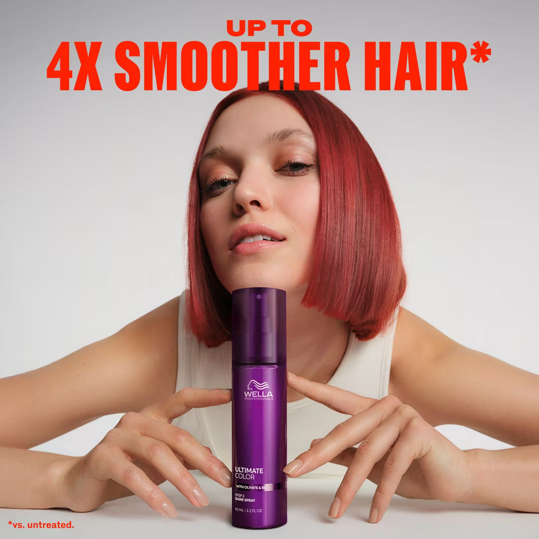 Woman with red hair holding a purple Wella bottle with text about smoother hair.