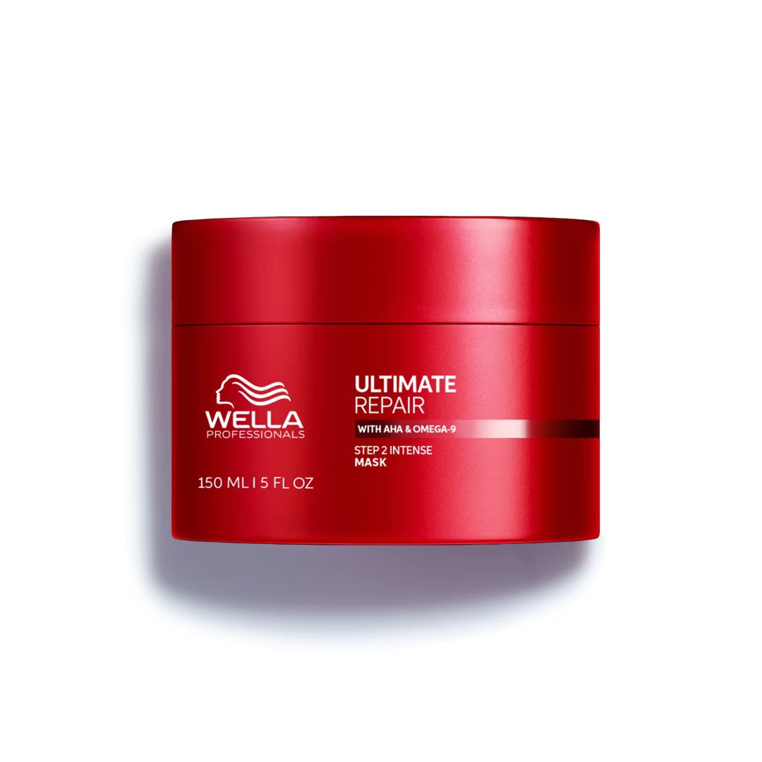 Red jar of Wella Professionals Ultimate Repair hair mask on a white background