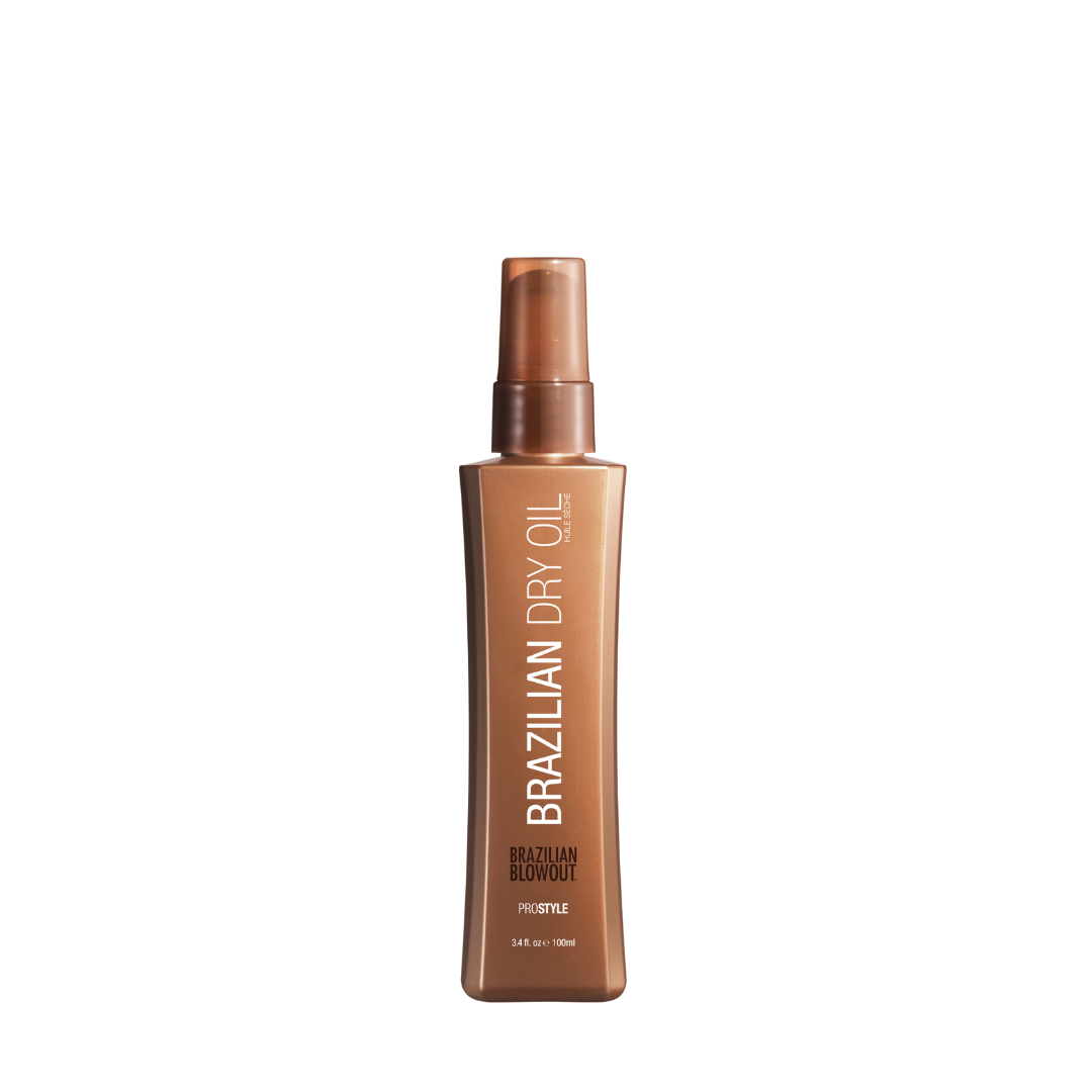 A 3.4 oz brown spray bottle of Brazilian Blowout Dry Oil, enriched with a Super-Nutrient Complex, from Brazilian Blowout—ideal for nourishing and styling hair.