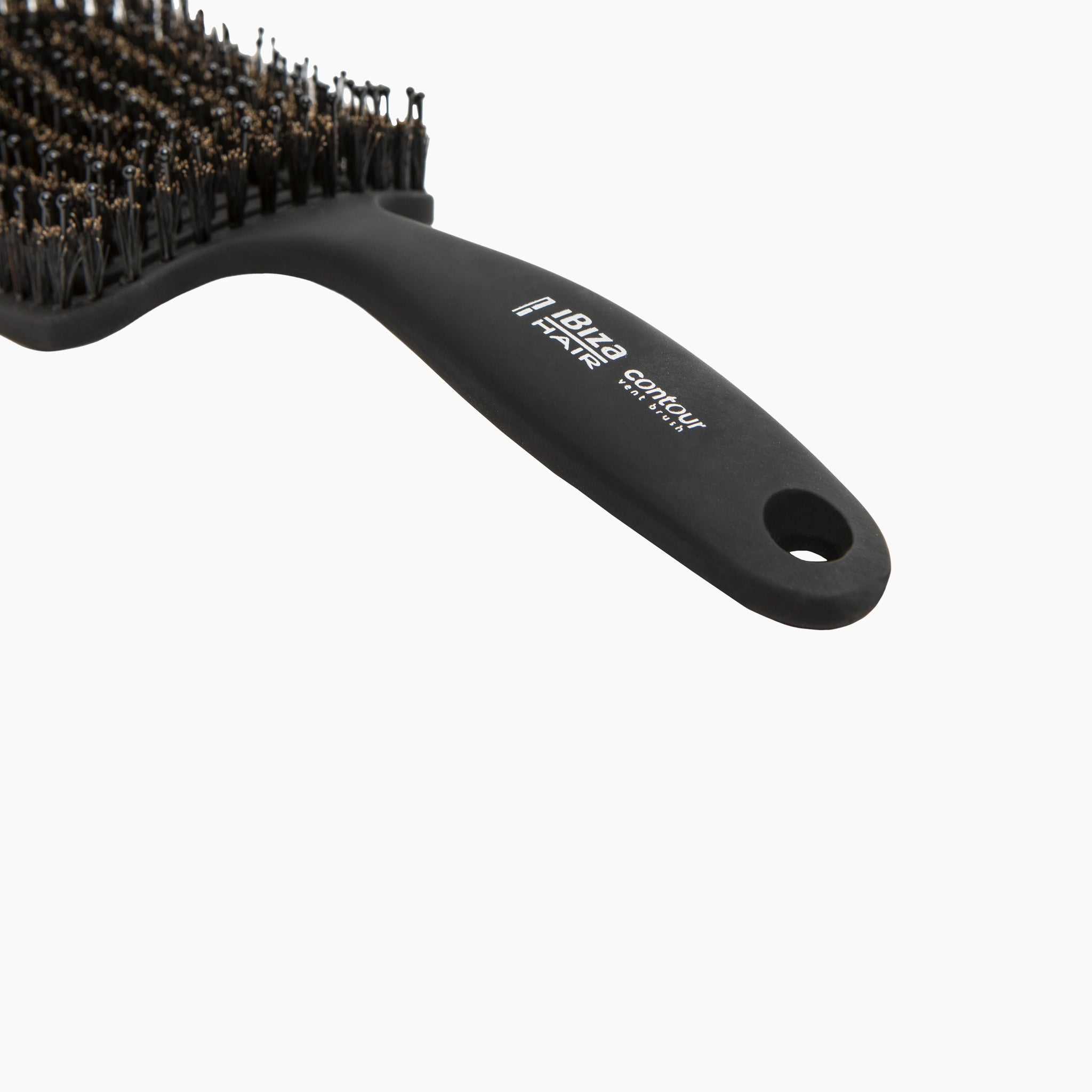 Black hairbrush with bristle head on a white background