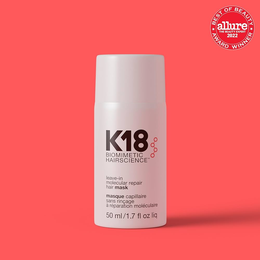 K18 hair mask bottle on a coral background with Allure award badge.