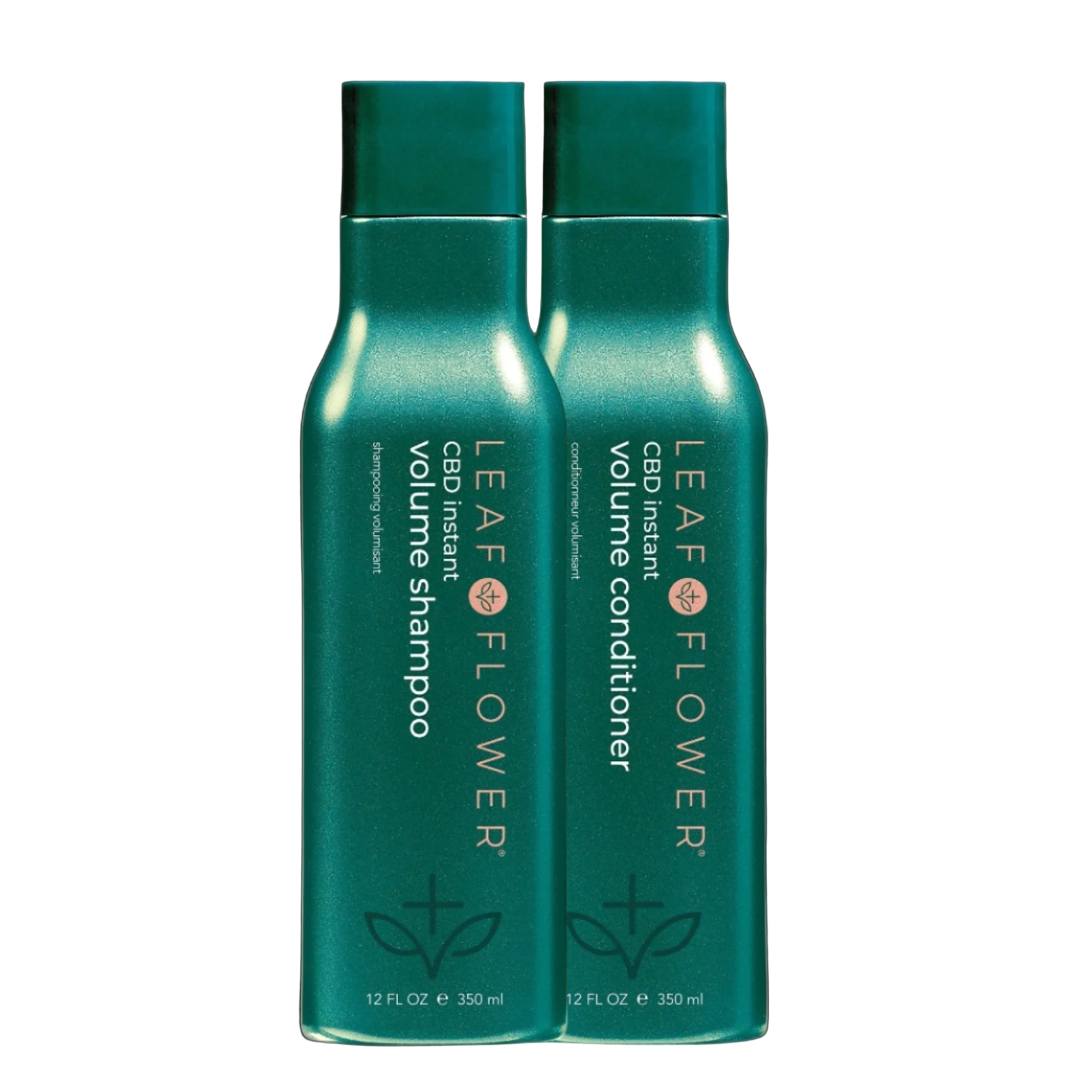 Two teal bottles of Leaf and Flower Instant Volume Shampoo and Conditioner Duo for fine hair, 12 fl oz each, feature white and gold text with a leaf design at the bottom.