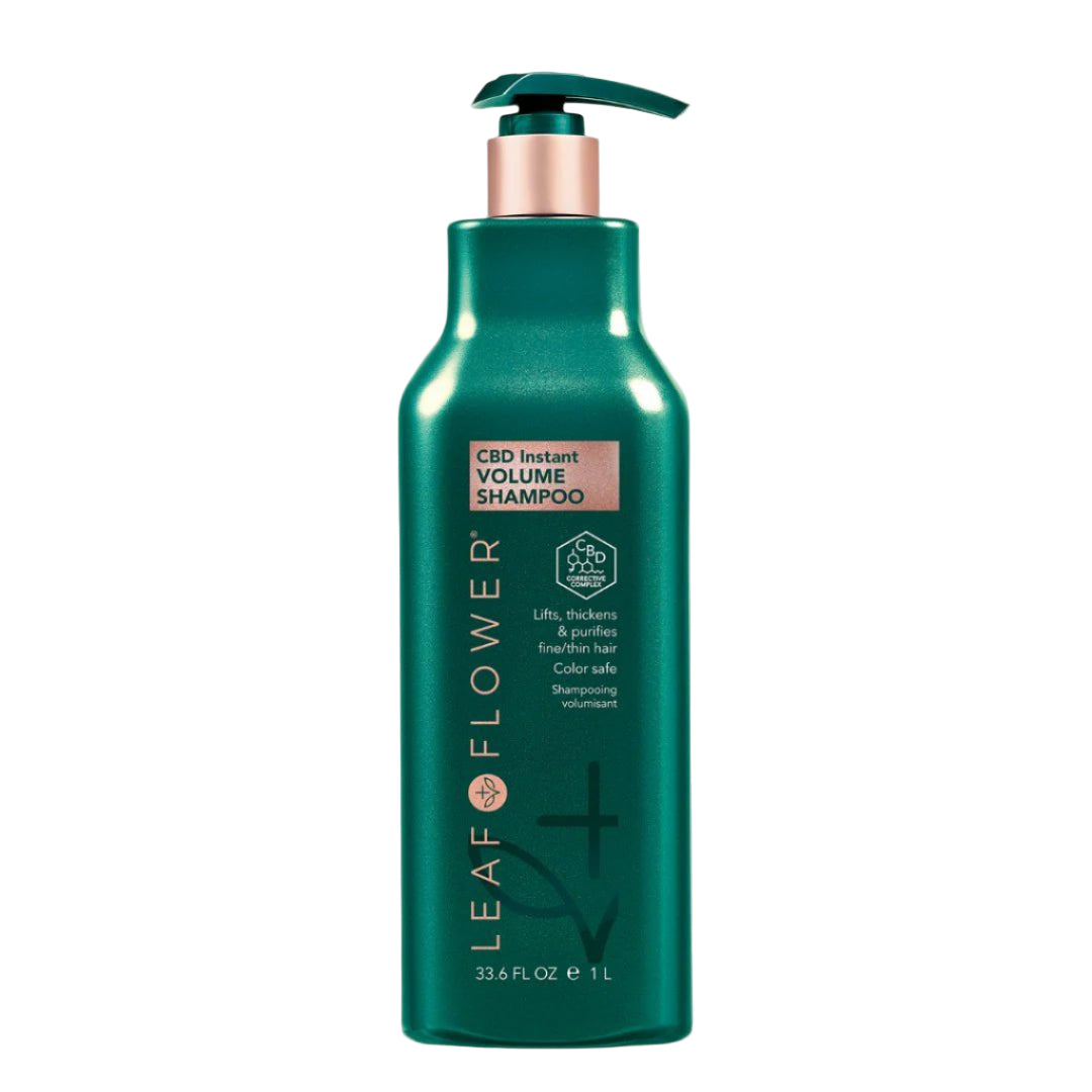 A 1-liter green bottle of LEAF and FLOWER Instant Volume Shampoo with a pump. Sulfate-free, plant-based formula thickens, purifies, and volumizes fine or limp hair while being color-safe. Multiple sizes available.