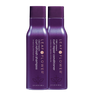 Two bottles of Leaf & Flower Instant Curl Repair Shampoo and Conditioner Duo, designed for hydration, against a white background.