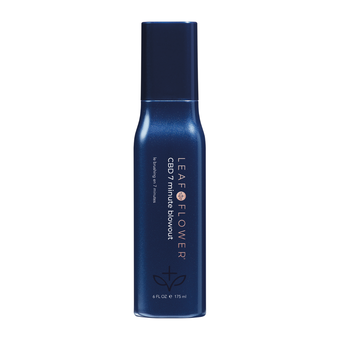 A bottle of LEAF and FLOWER 7 Minute Blowout hairspray to minimize damage and reduce drying time.