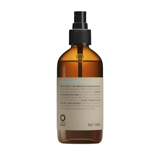 Amber-colored spray bottle with black nozzle, filled with Oway Phytoprotein Mist, a clear leave-in treatment for strengthening fragile hair and preventing breakage. The light label shows text in multiple languages and the "O" logo at the bottom.