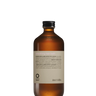 Clear glass bottle with brown cap featuring a beige label and 240 ml of Oway Smoothing Hair Bath | Frizz-Control Shampoo for Coarse or Unruly Hair, enriched with biodynamic caraway extract.