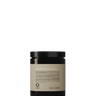 A brown jar of Oway Sunset Hour Hair Mask | Radiance-Boosting Mask for Golden Blonde Hair is displayed against a black textured background.