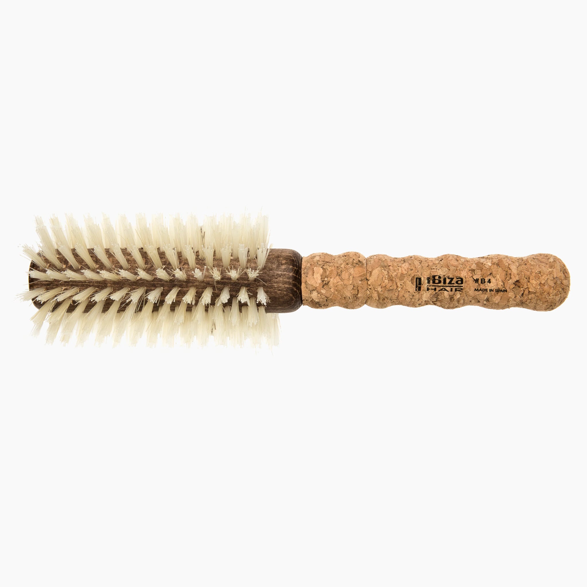 Round brush with cork handle on a white background