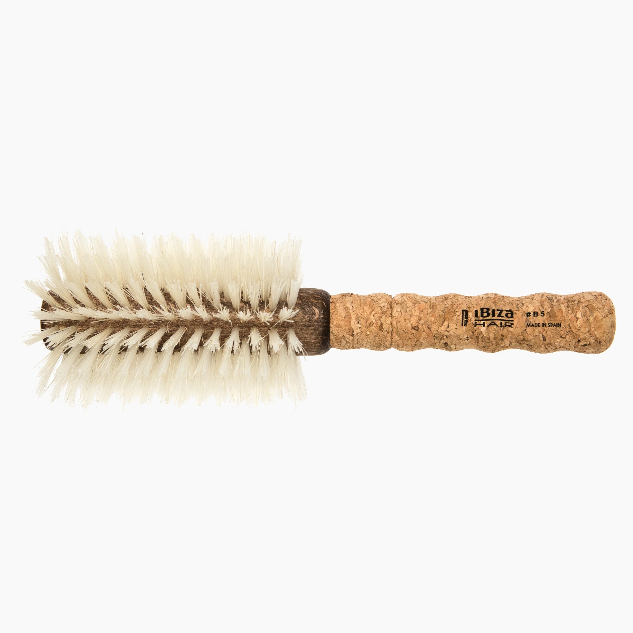 Bottle brush with cork handle on a white background