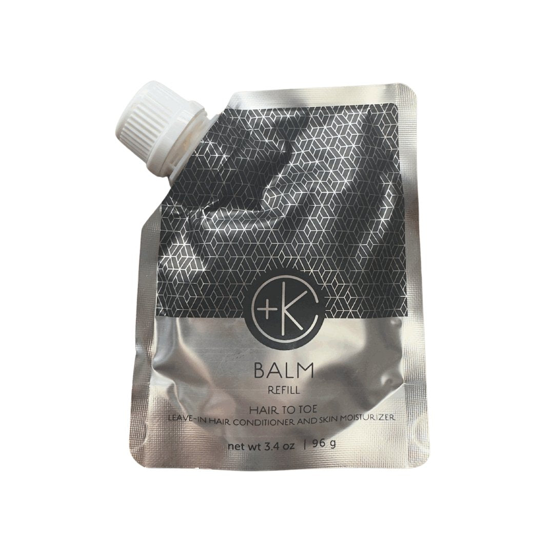 A silver and gray refill pouch labeled “Cult and King BALM | Hair to Toe” with a white twist cap, highlighted as a moisturizing leave-in hair conditioner and skin moisturizer for advanced care. Size: 3.4 oz (96 g).