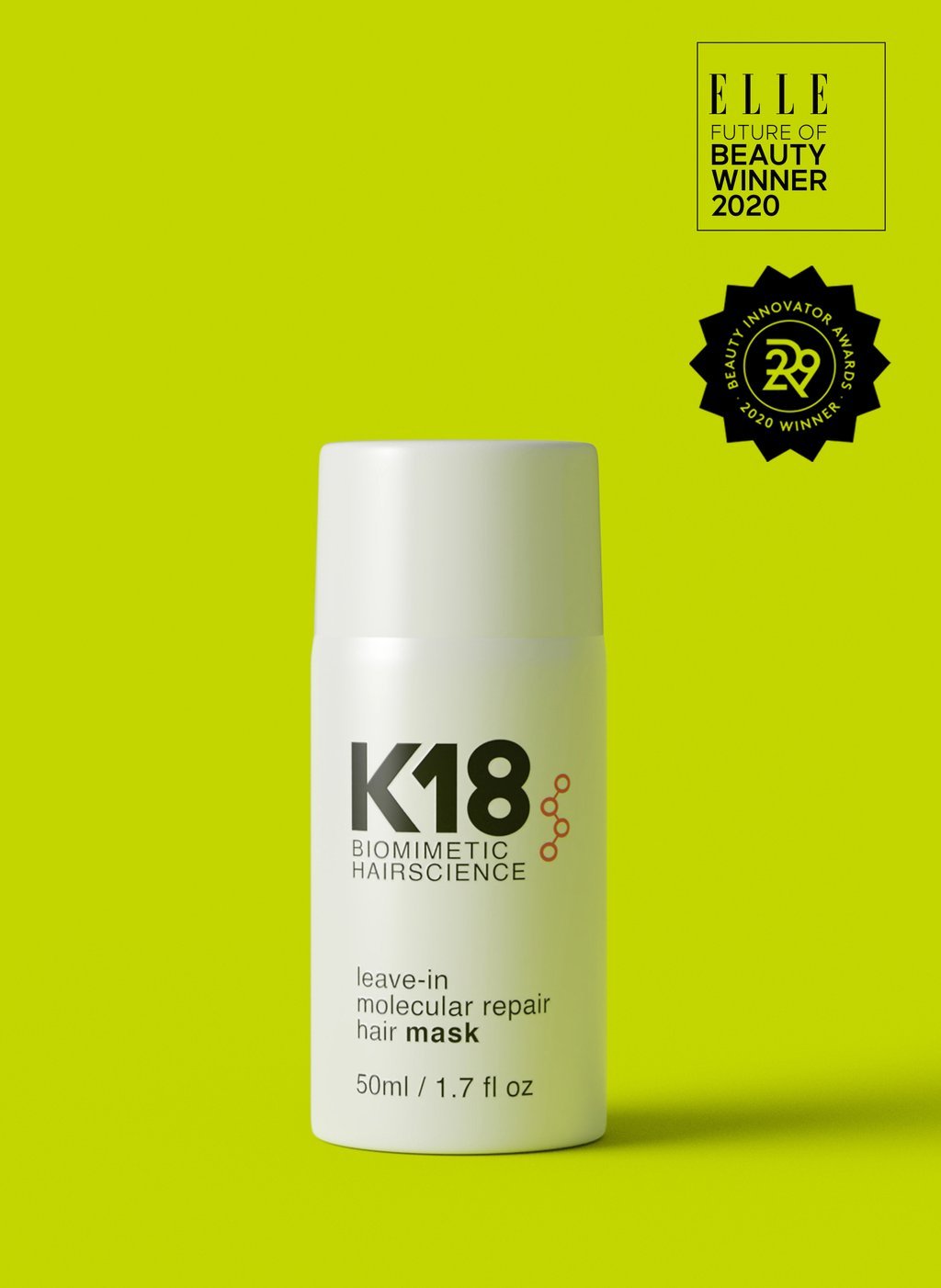 A white bottle of K18 Hair Repair by K18 Hair Repair, a leave-in molecular repair hair mask, stands against a bright green background with award logos in the top right corner.