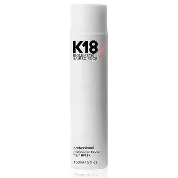 A white cylindrical bottle labeled "K18 Hair Repair, 150ml / 5 fl oz," featuring advanced peptide technology for effective hair rejuvenation.
