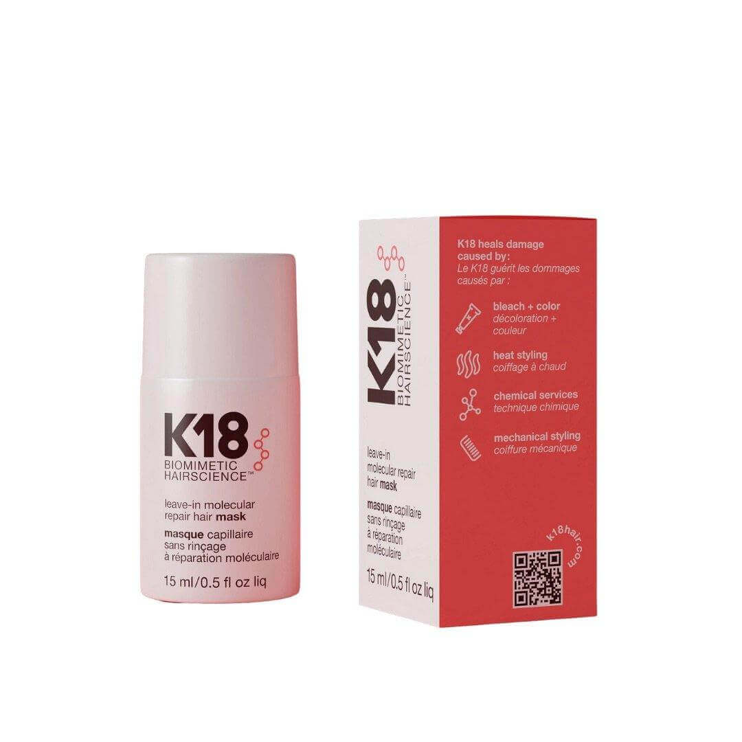 K18 Hair Repair leave-in molecular repair mask, 15 ml bottle by K18 Hair Repair, uses peptide technology for advanced hair rejuvenation and is shown next to its pink packaging with product details.