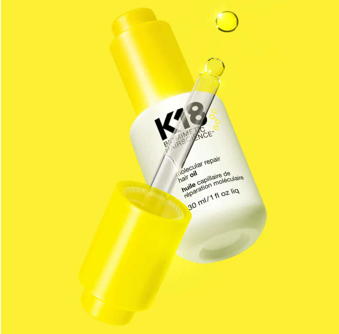 A bottle of frizz-fighting K18 Molecular Repair Hair Oil from K18 Hair Repair.