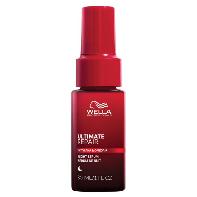 Red Wella bottle of Ultimate Repair Night Serum on a white background
