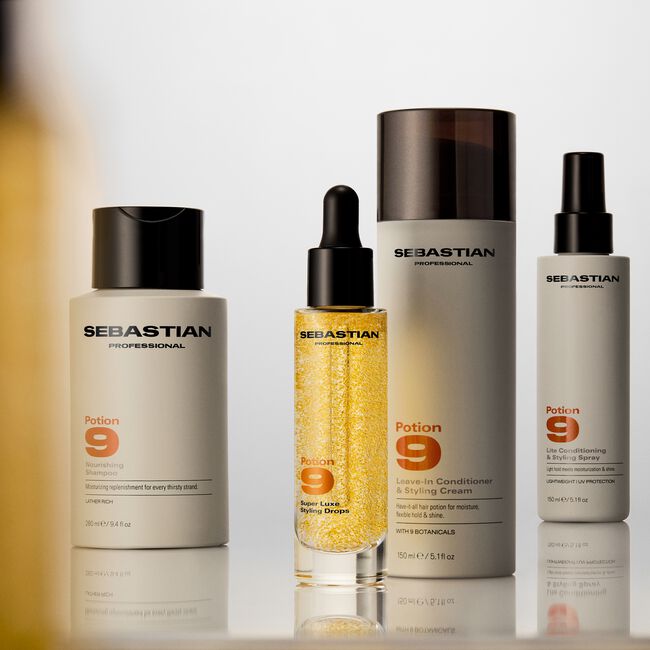 Set of Sebastian hair care products on a reflective surface with a neutral background