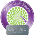 A badge with a green dotted spiral and the words "Green Circle Salons" in a purple ring, with a silver label reading "Certified Salon" at the bottom.
