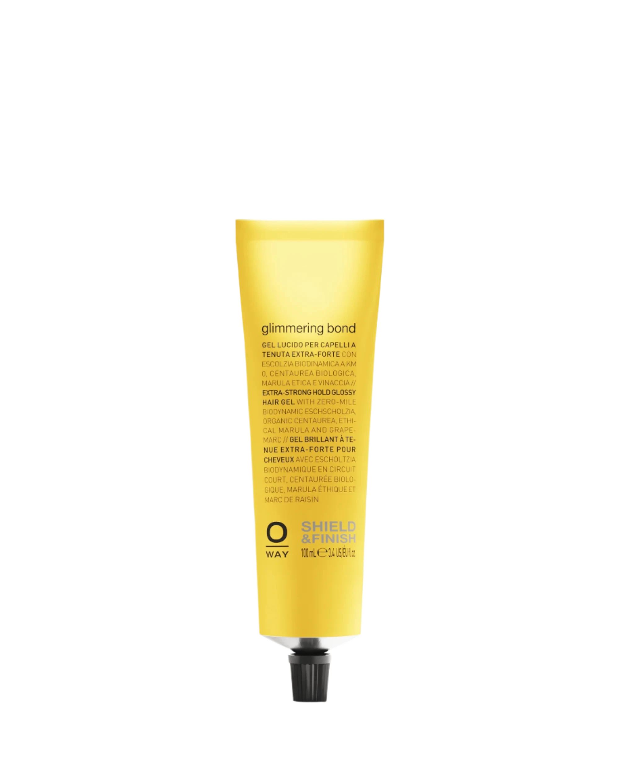 A yellow tube of Oway Glimmering Bond | Bonding Shine Treatment for Damaged, Dull Hair stands upright on a dark textured background, formulated with ethical marula oil for extra care and shine.