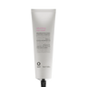 A white tube of Oway Rebuilding Hair Mask | Restorative Mask for Damage and Instant Repair, labeled with its use for damaged or chemically treated hair, is shown against a black textured background.
