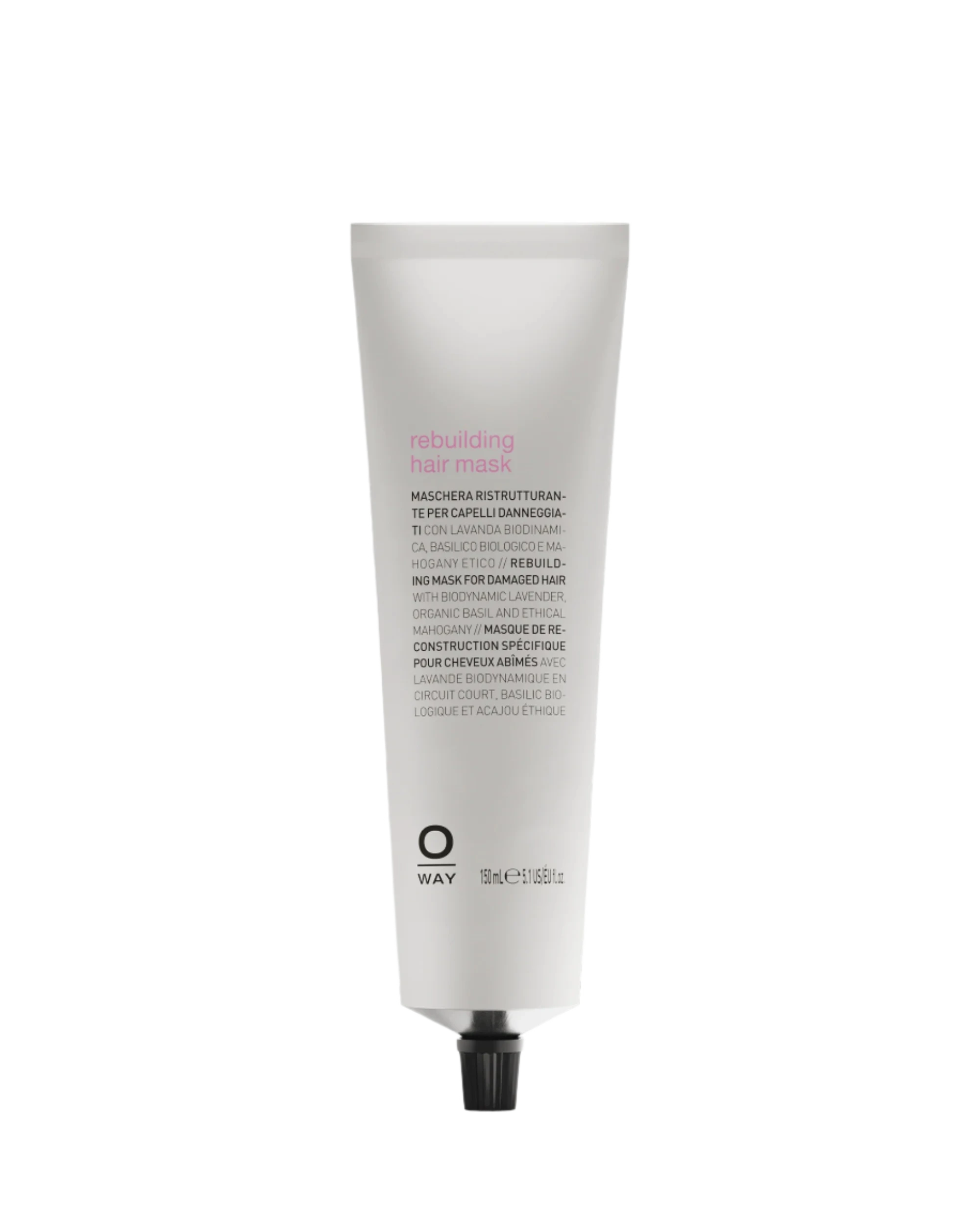 A white tube of Oway Rebuilding Hair Mask | Restorative Mask for Damage and Instant Repair, labeled with its use for damaged or chemically treated hair, is shown against a black textured background.