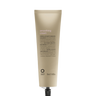An upright beige tube of Oway Smoothing Cream | Blow Dry Cream for Sleek, Straight Styles with a black cap is displayed against a dark textured background—perfect for taming frizz and achieving smooth hair.
