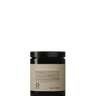 A brown jar of Oway Sunset Hour Hair Mask | Radiance-Boosting Mask for Golden Blonde Hair is displayed against a black textured background.