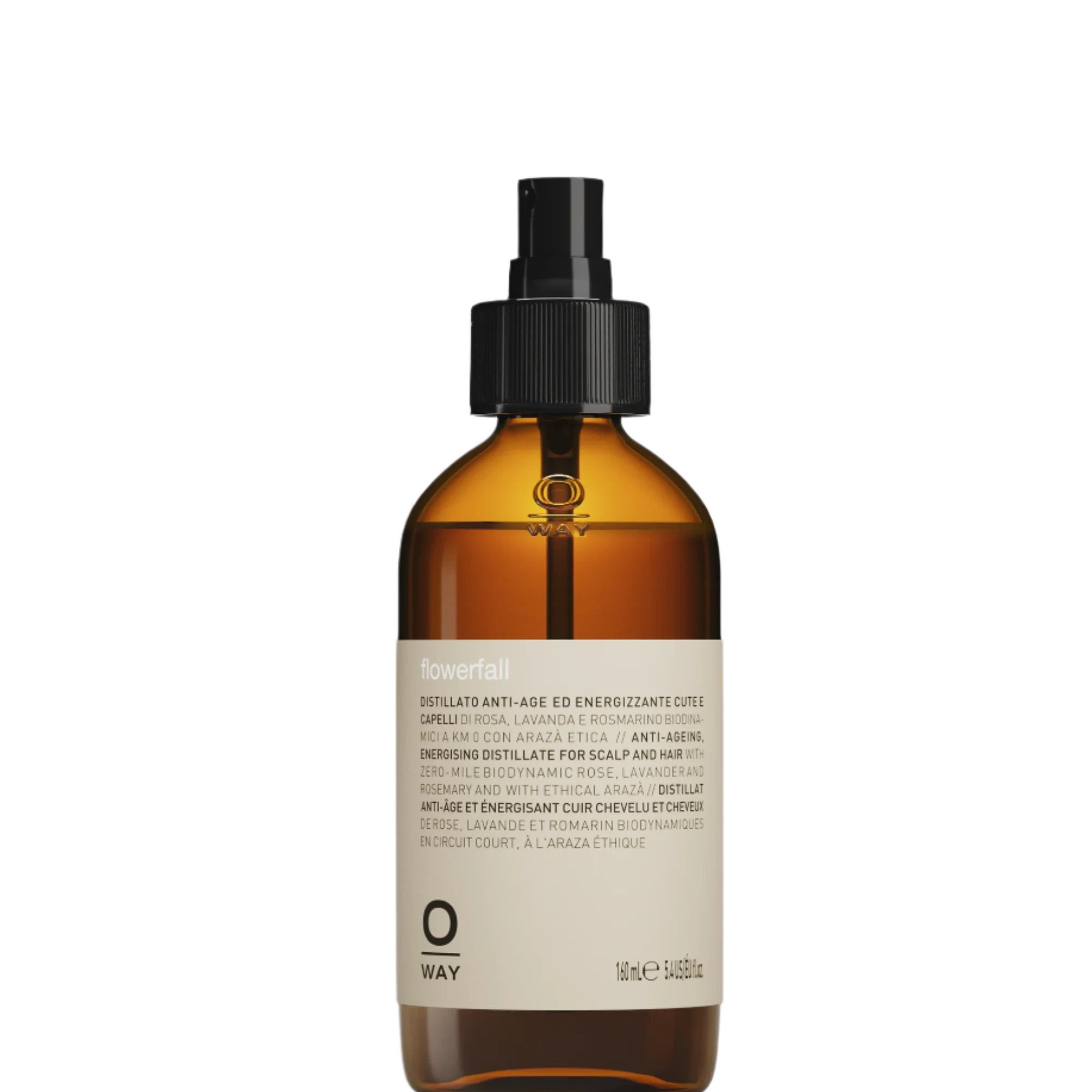The Oway Flowerfall Aromatherapeutic Scalp and Mind Balancing Mist comes in an amber glass spray bottle with a black nozzle and beige label, offering holistic scalp care using Biodynamic Lavender.