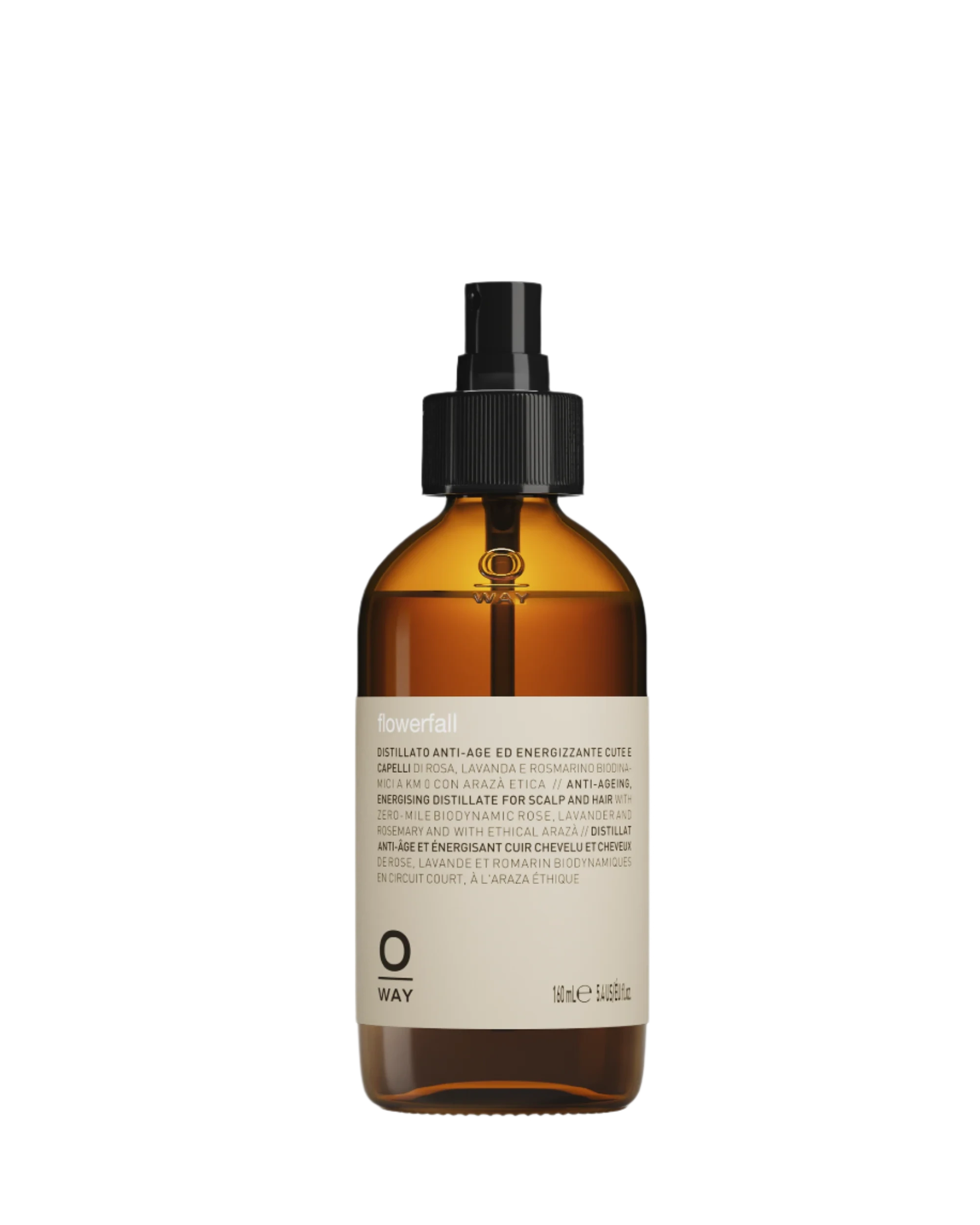 The Oway Flowerfall Aromatherapeutic Scalp and Mind Balancing Mist comes in an amber glass spray bottle with a black nozzle and beige label, offering holistic scalp care using Biodynamic Lavender.