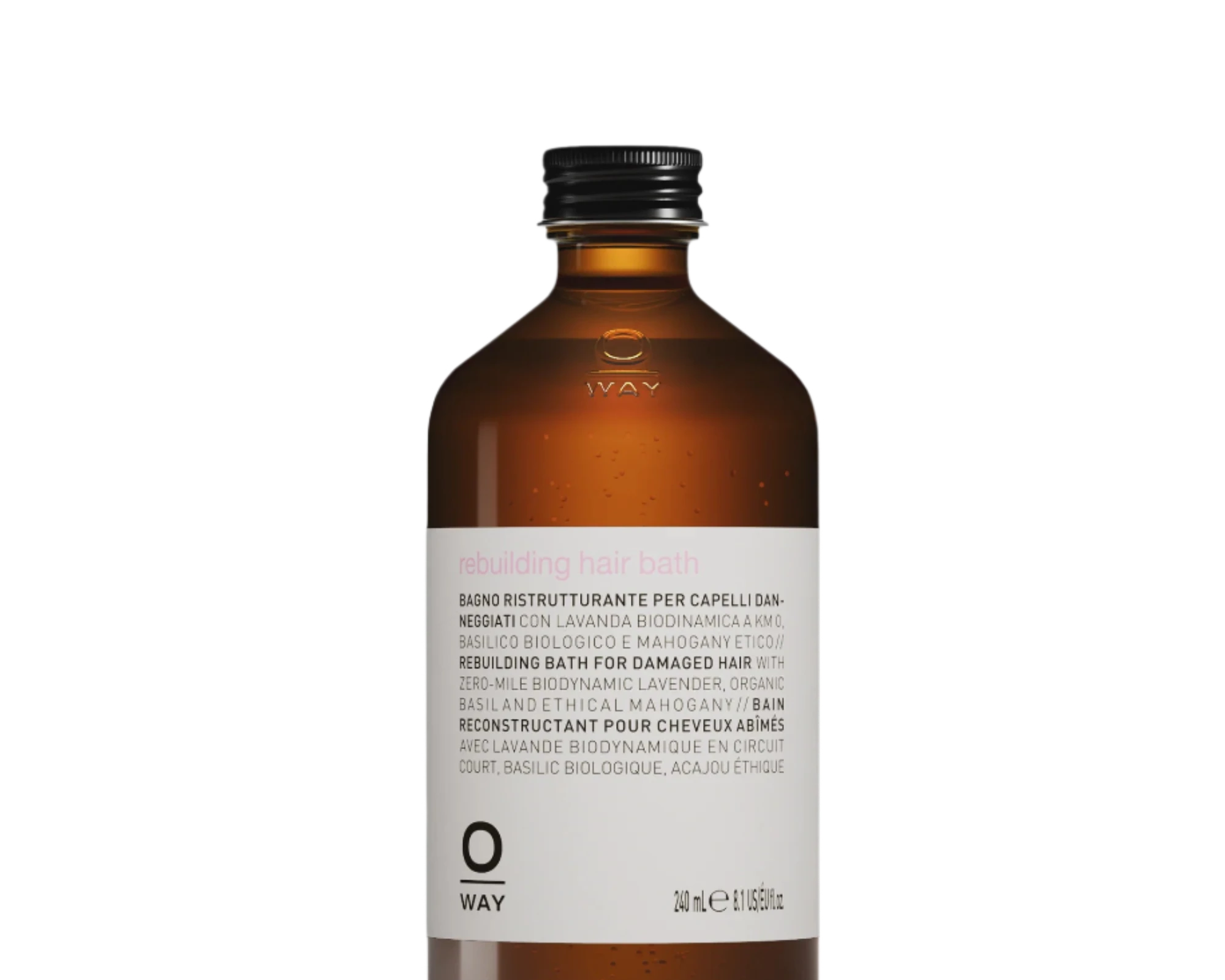 A 240ml brown glass bottle labeled “Oway Rebuilding Hair Bath | Strengthening Shampoo for Brittle, Weak Hair” by Oway features a black screw cap and plant-derived keratin to strengthen damaged hair.