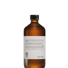 A 240ml brown glass bottle labeled “Oway Rebuilding Hair Bath | Strengthening Shampoo for Brittle, Weak Hair” by Oway features a black screw cap and plant-derived keratin to strengthen damaged hair.