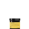 A black jar labeled "Oway Shaping Putty | Flexible Styling Putty for Sculpted Texture" with yellow and white text stands against a textured black background, highlighting Oway’s styling putty for medium hold and a natural finish.