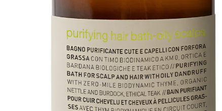 A 240 ml brown glass bottle of Oway Purifying Hair Bath for Oily Scalp, featuring multilingual front labeling. An organic shampoo by Oway, ideal for gently clarifying and balancing oily scalps.