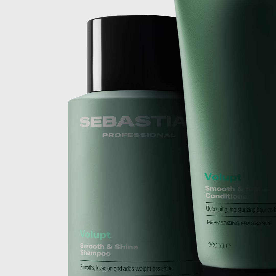 Two green bottles of Sebastian Professional hair care products on a light gray background