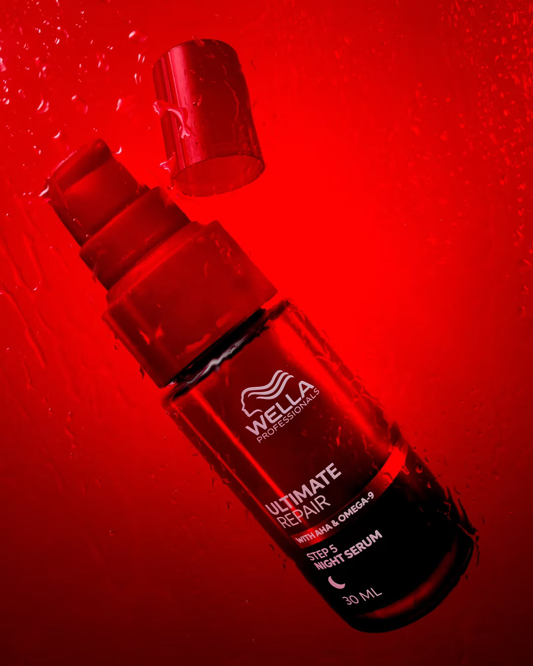 Wella serum bottle on a red background