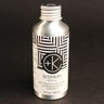 A metallic bottle labeled "Cult and King SETSPRAY Refill" with a black and white geometric design contains Semi-Precious Tri-Phase Wonderworking Hairspray infused with Malachite Extract. The bottle volume is 4 fl oz (118 ml).