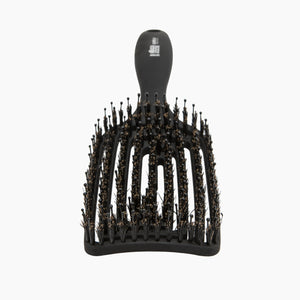 Black hairbrush with bristle head on a white background