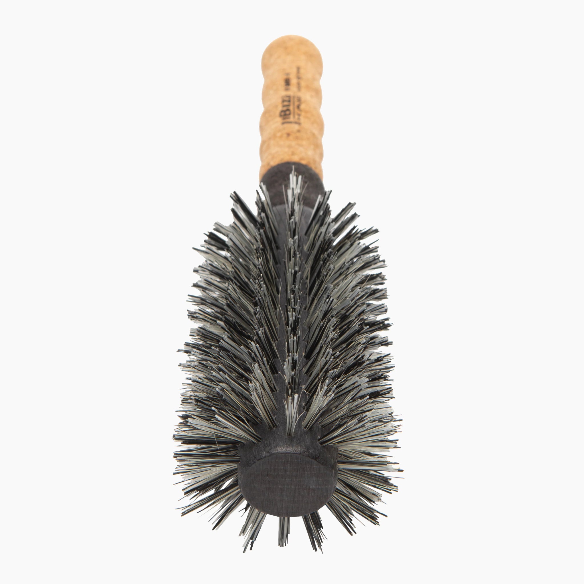 Round hairbrush with cork handle on a white background