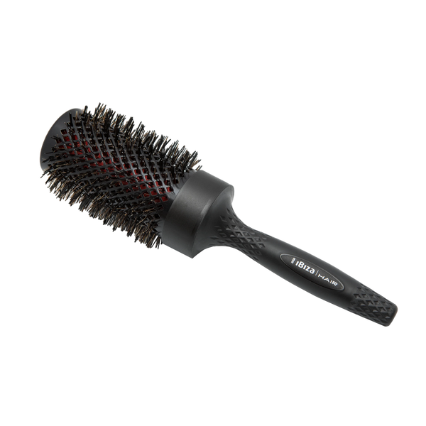 Black round hairbrush with bristle head on a white background