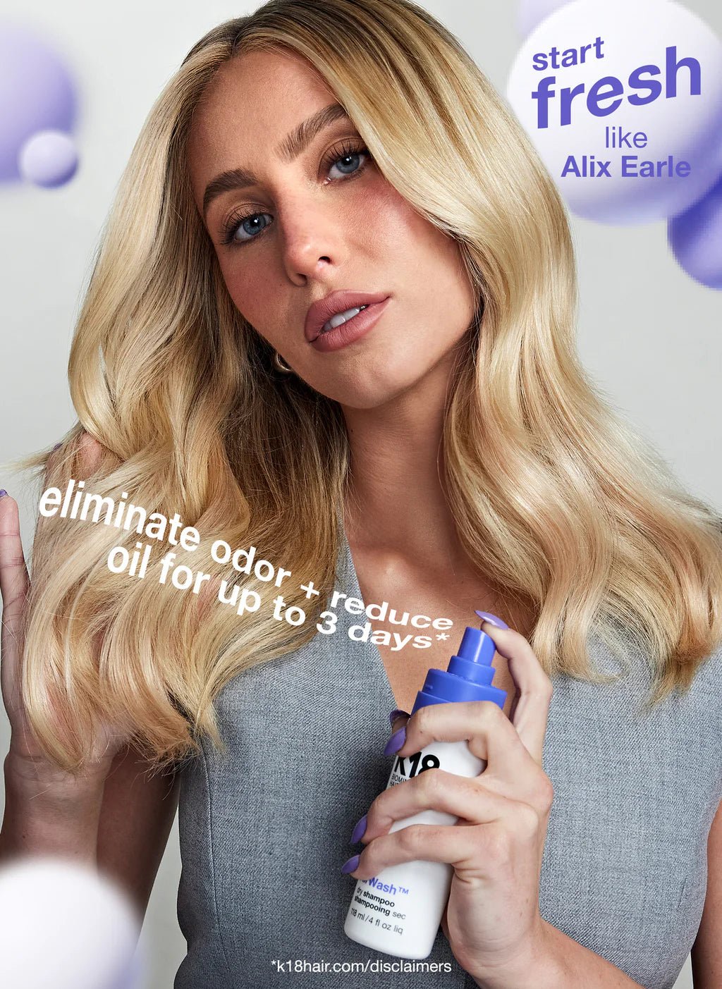 A person with long blonde hair holds a bottle of K18 AirWash Dry Shampoo by K18 Hair Repair. Text on the image reads "eliminate odor + reduce oil for up to 3 days".