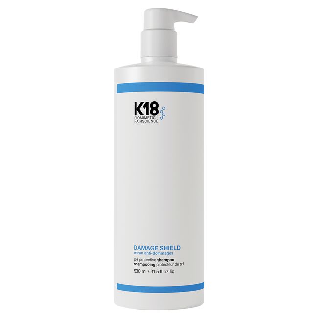 K18 Damage Shield shampoo bottle on a white background
