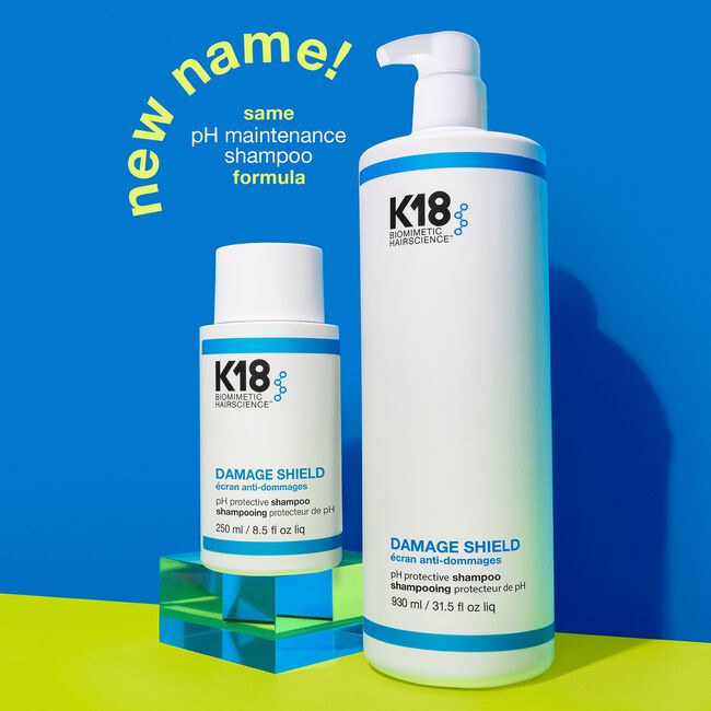 Two K18 Damage Shield shampoos on a blue and green background with text indicating a 'new name'.
