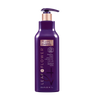 A bottle of Leaf and Flower Instant Curl Refresh Shampoo, with a purple flower, designed to enhance curls by removing build-up and excess natural oils.